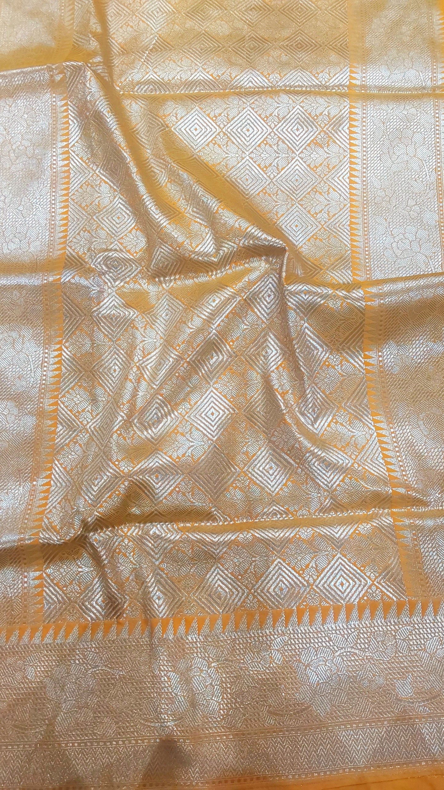 Yellow Banarasi Saree with Silver Zari Kodi Malar Designs