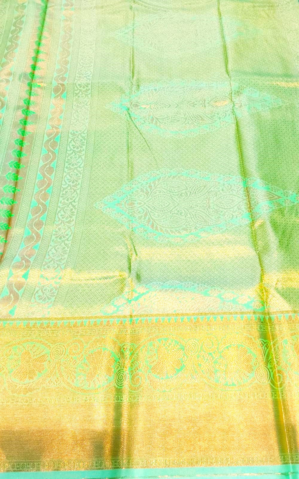 Simple Party Wear Saree in Orange with Yellow and Zari Border