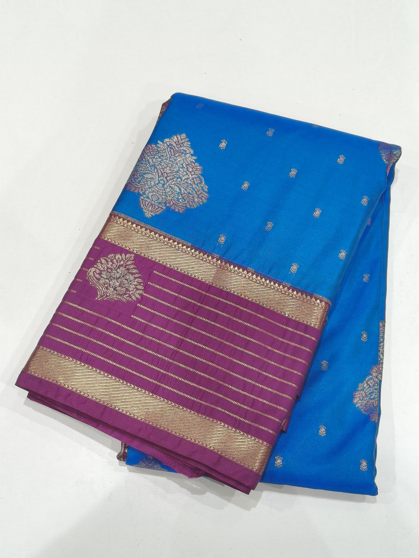 Soft Silk Saree – Blue with Violet Contrast Border & Floral Butta Design