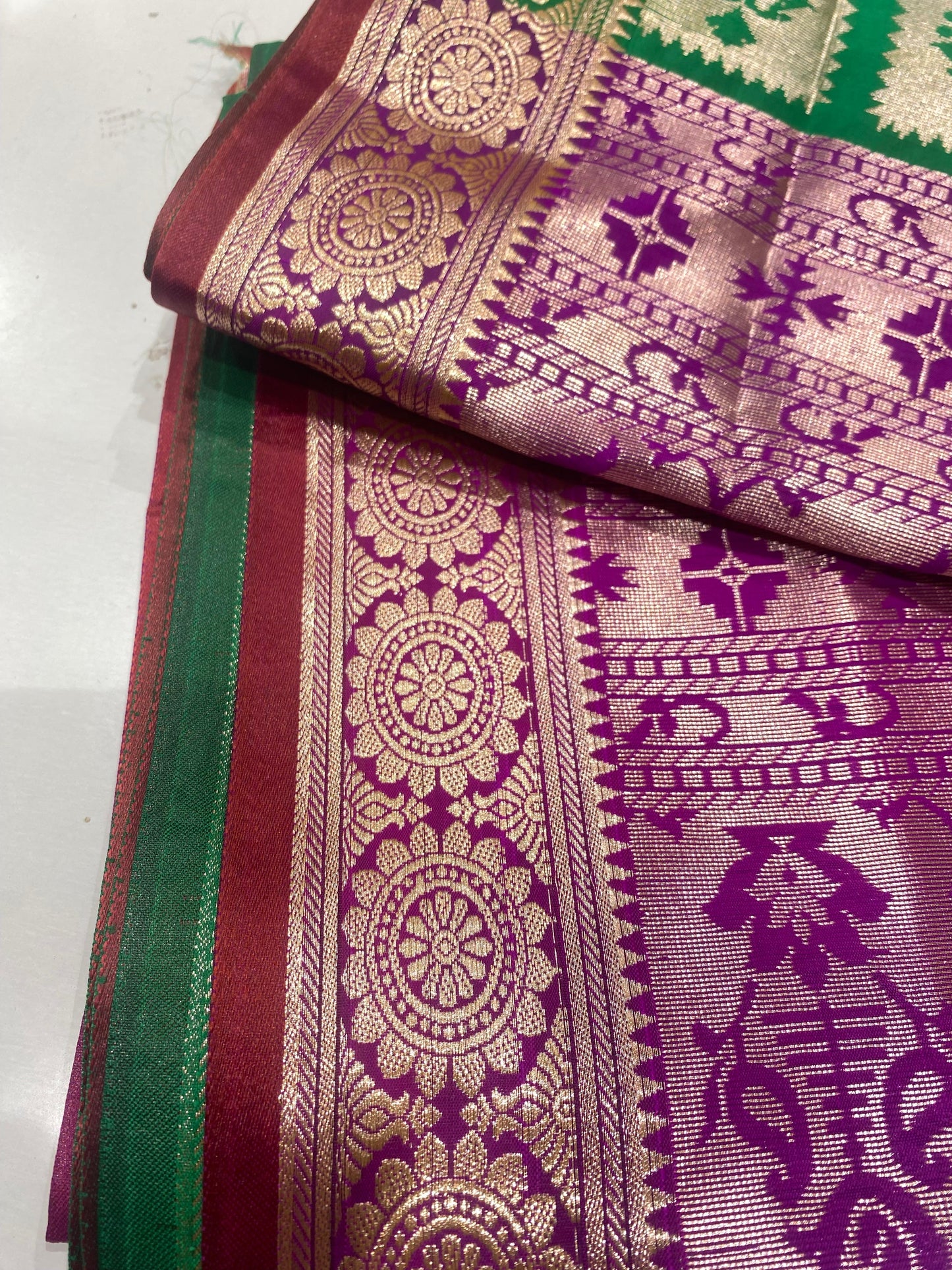 Semi Silk Saree – Green with Violet Contrast Border & Mango Buttas