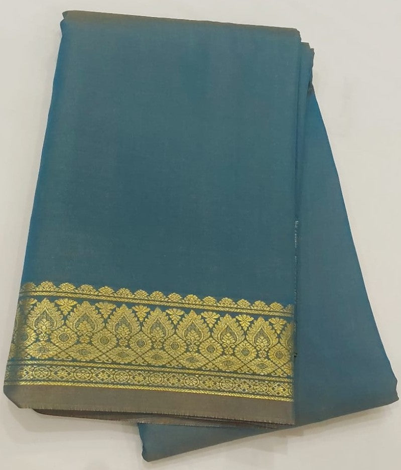 Peacock blue with light green shade soft silk saree with orange color Pallu