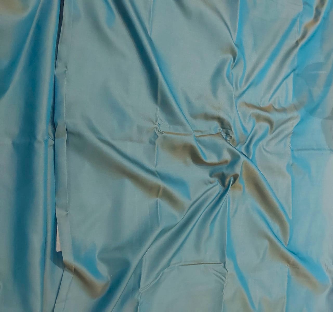 Peacock blue with light green shade soft silk saree with orange color Pallu