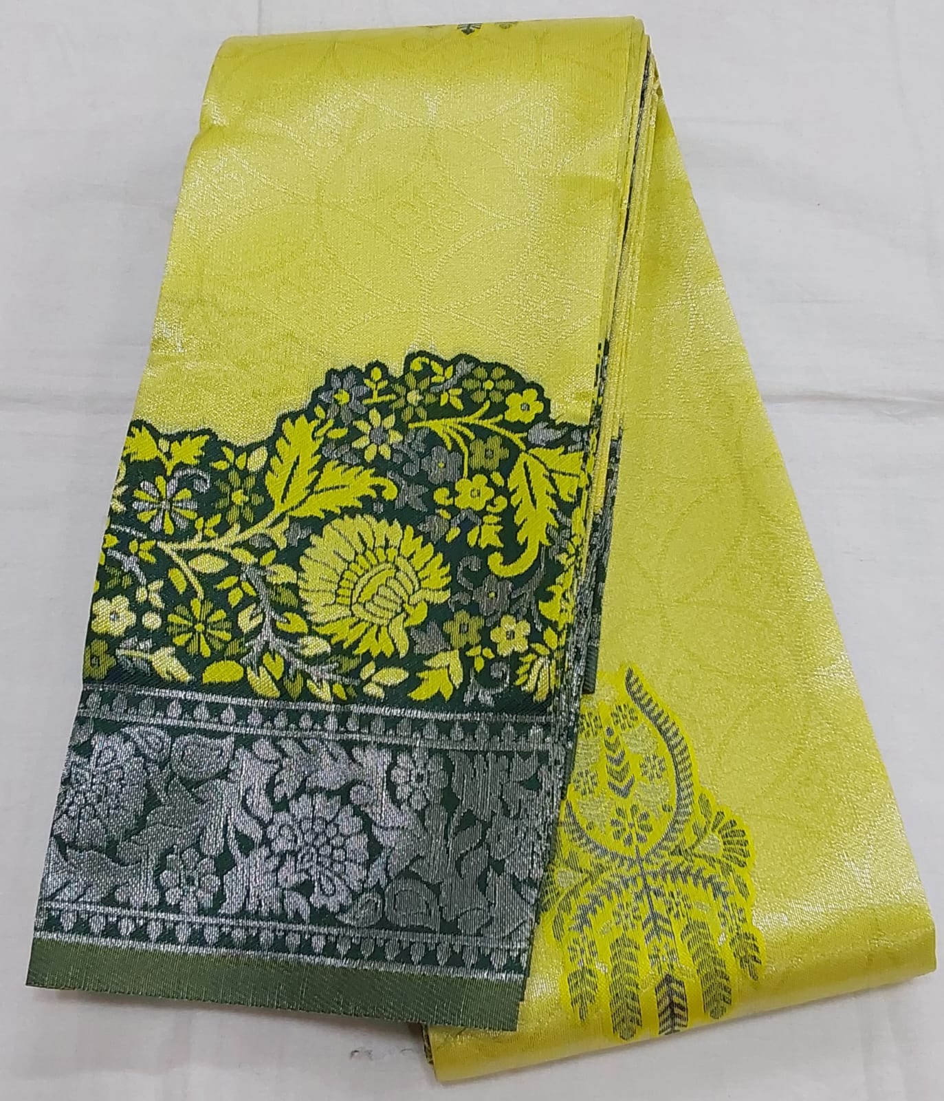 Lemon Yellow Color Semi Silk Saree with bottle green color Flower border