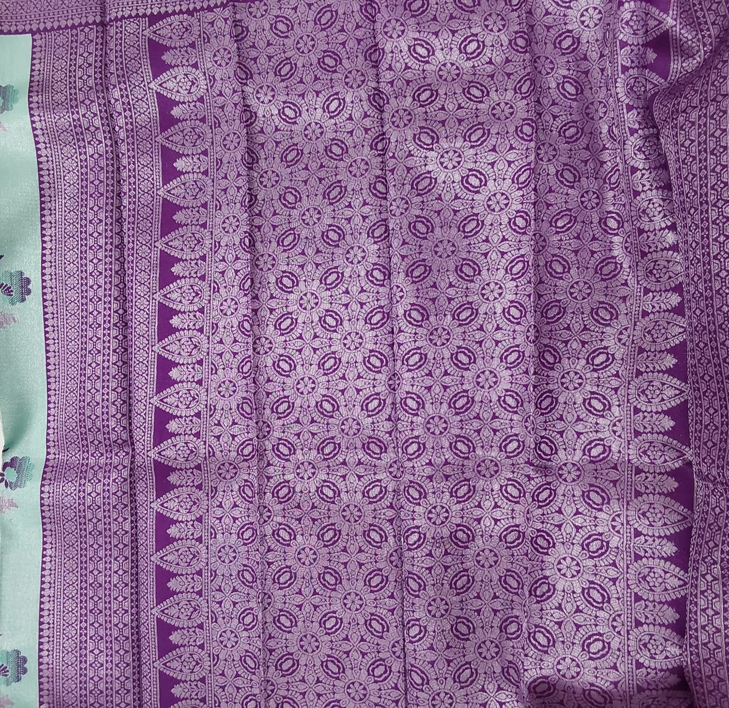 Rexona Green color semi silk saree with purple color border silver Zari work