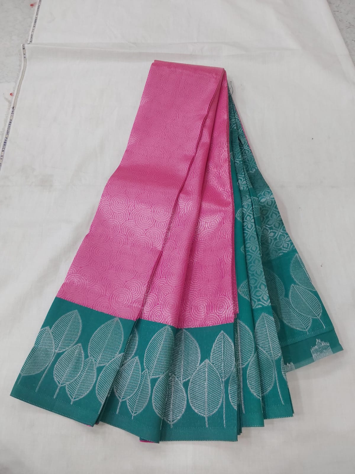 Pink color Semi Silk saree with Rexona green color border silver Zari work