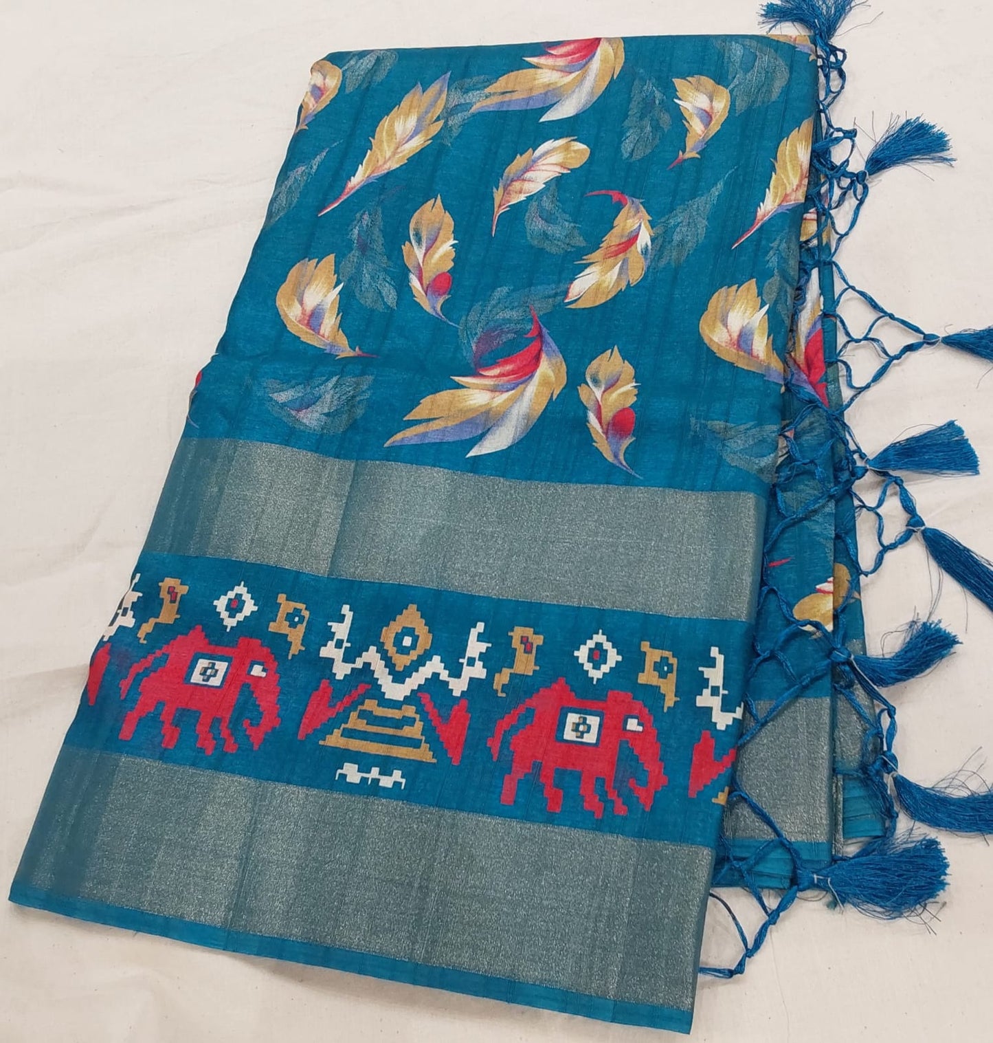 Fancy Peacock Blue Color Tussar Silk Saree With Zari Border