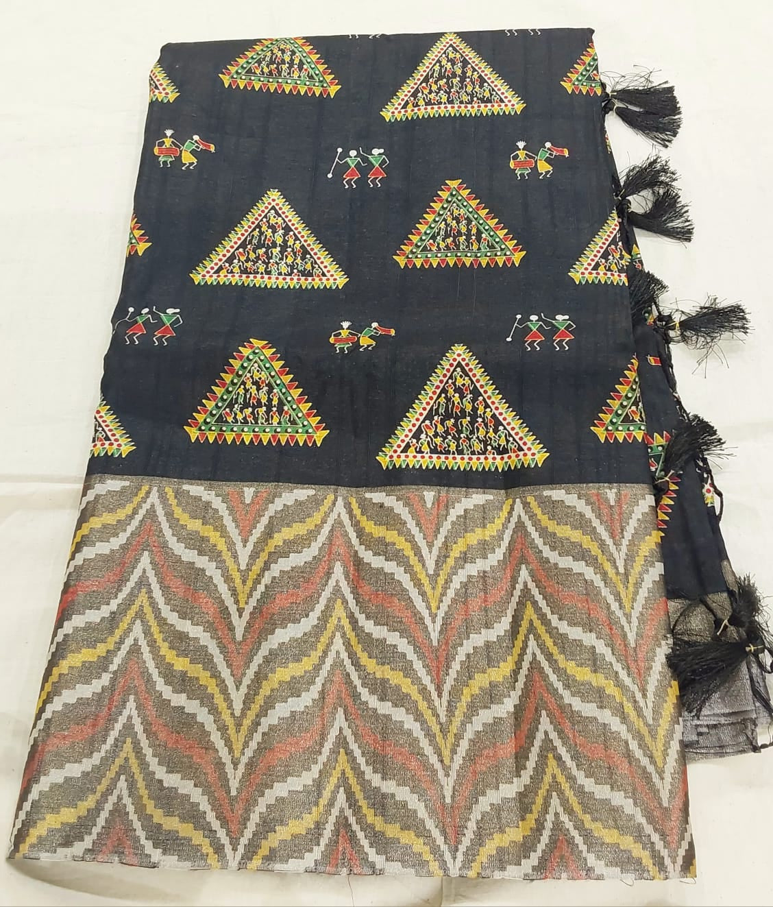 Fancy Black color Tussar Silk saree with Zari border