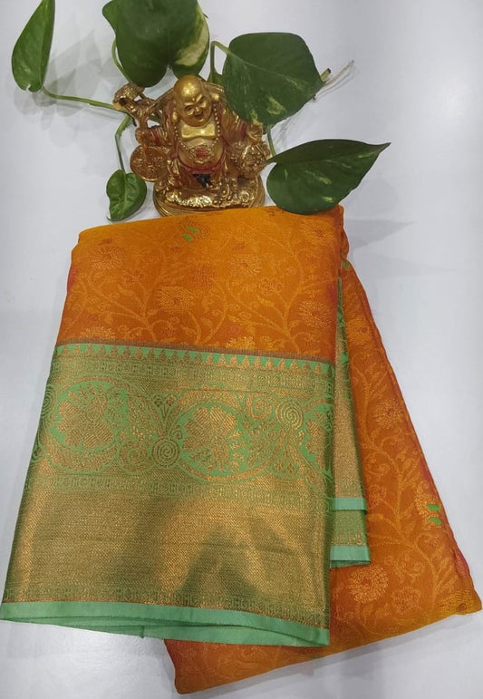 Simple Party Wear Saree in Orange with Yellow and Zari Border