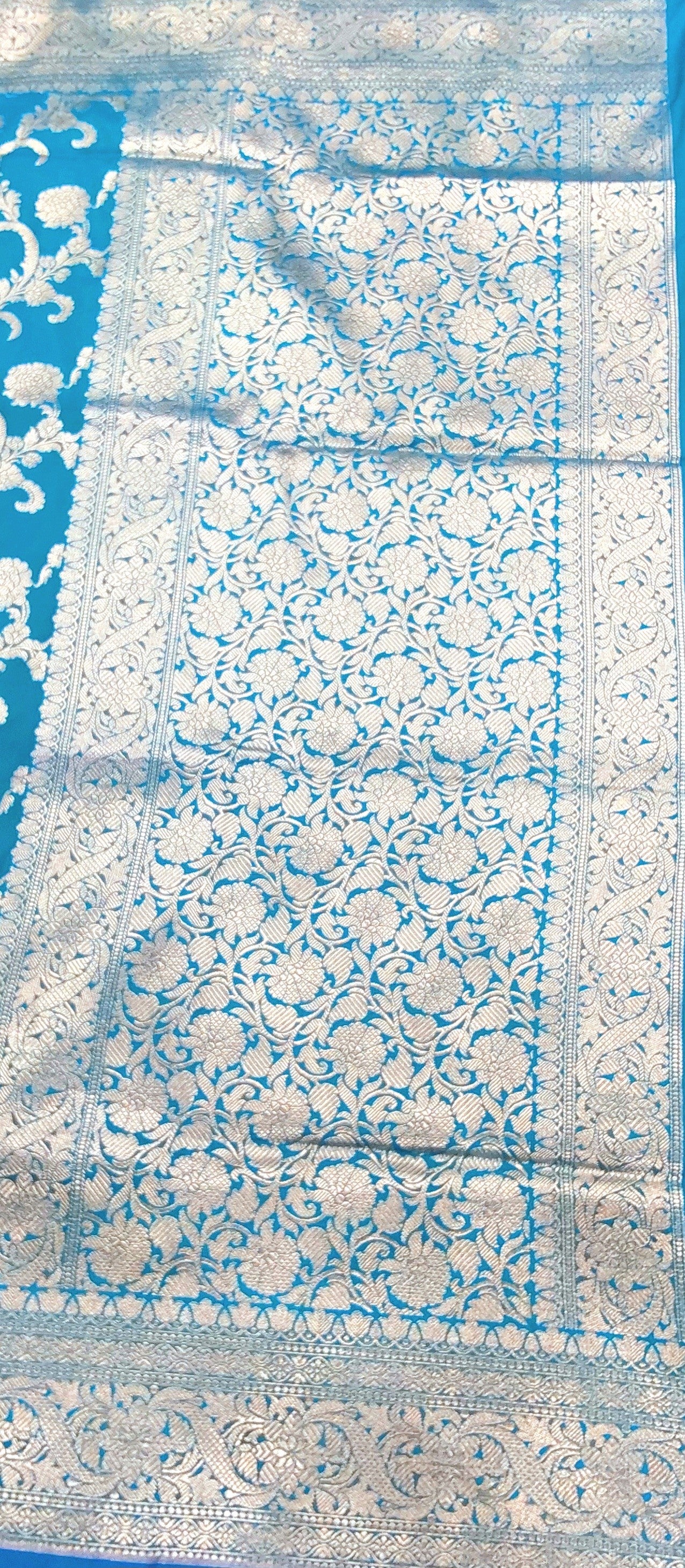 Blue Banarasi Saree with Silver Zari Kodi Malar Designs