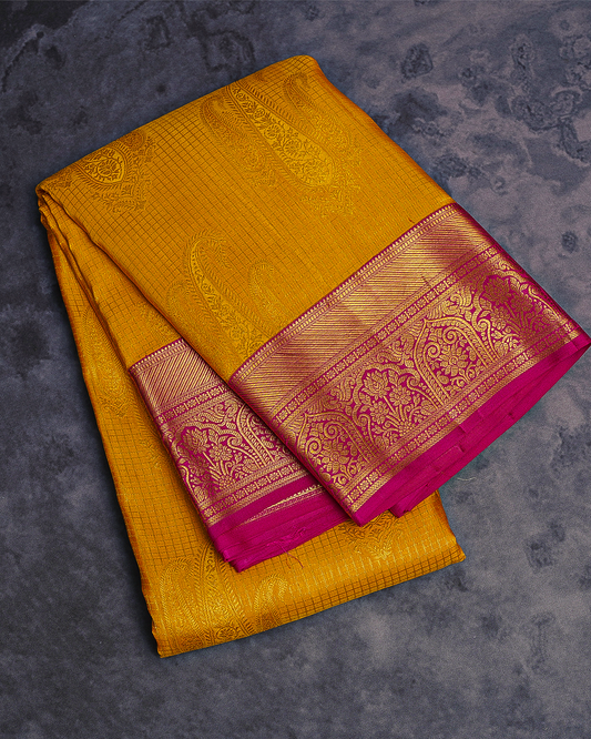 Yellow Silk Saree with Contrast Pink Border