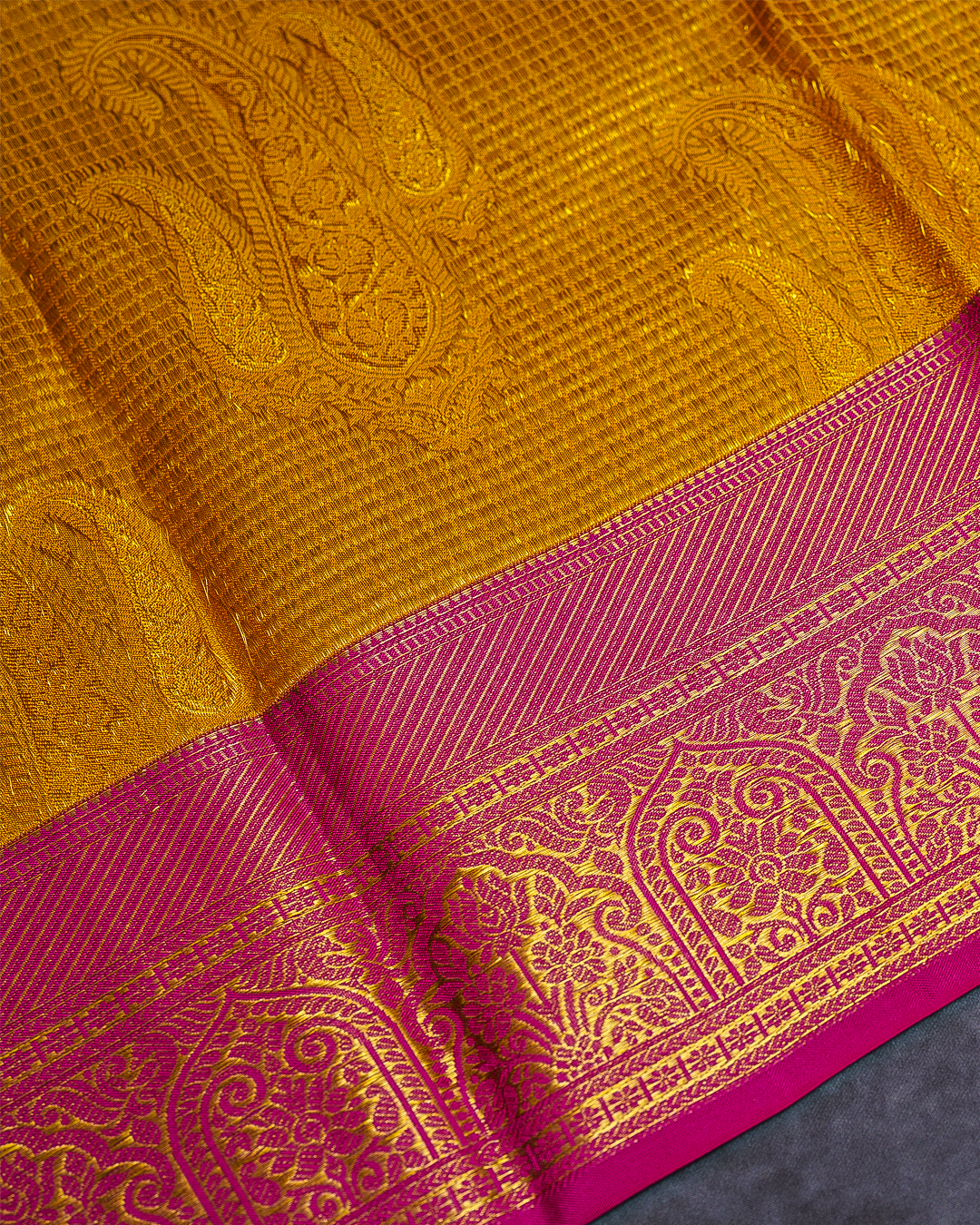 Yellow Silk Saree with Contrast Pink Border