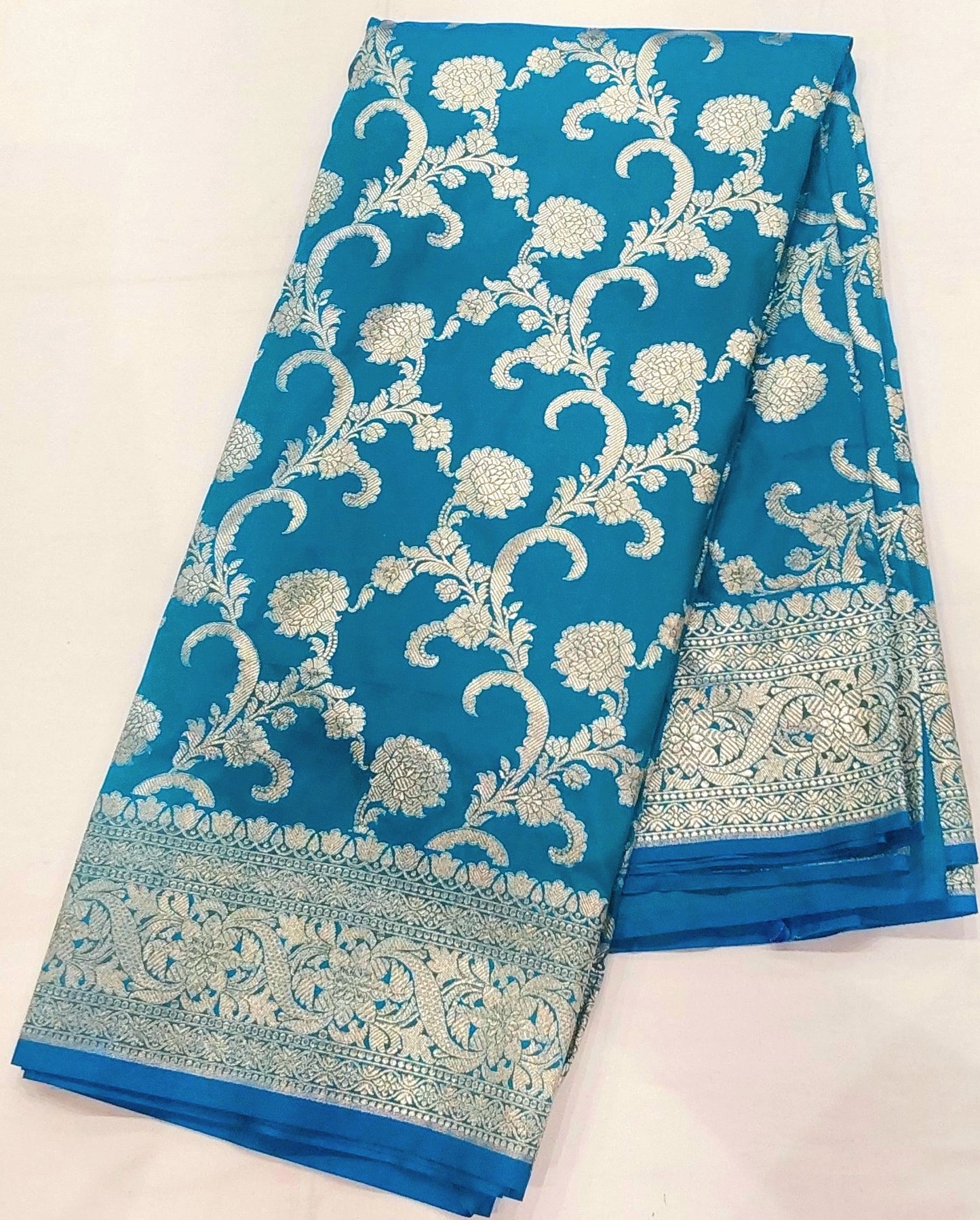 Blue Banarasi Saree with Silver Zari Kodi Malar Designs