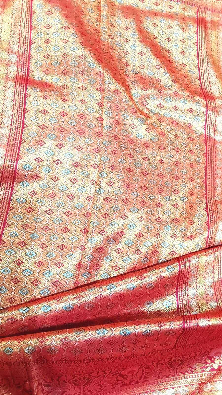 Gold Banarasi Saree with Red Border and Peacock Kodi Malar Designs