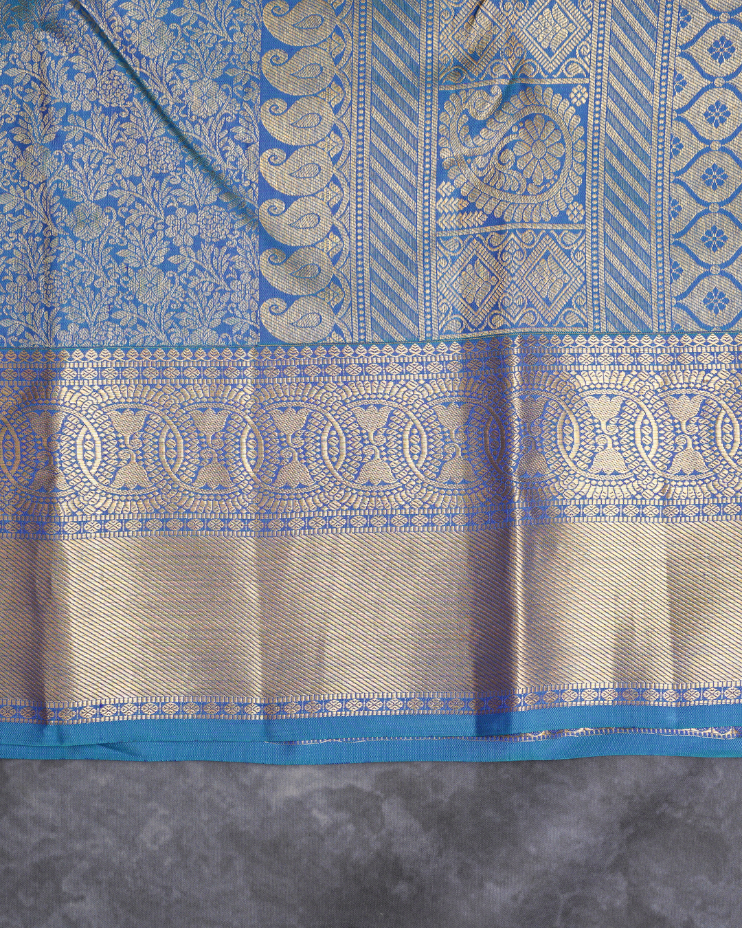 Blue Kanchi Silk Wedding Saree with Lotus Circle Border and Kodi Malar Design