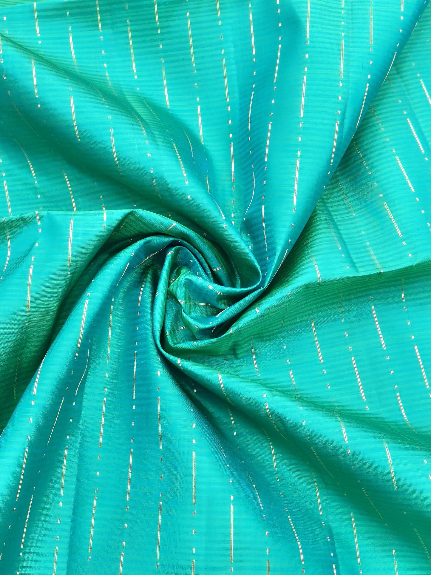 🌿 Step into elegance with this Rexona Green Pure Soft Silk Saree, gracefully detailed with traditional butta designs.